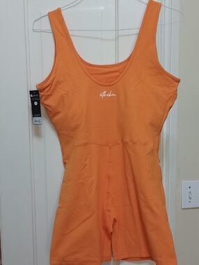 NWT ETHIKA BOLT ORANGE BIKER SHORTS ROMPER. SLIM! SEXY! FIRM! Built-in Bra.
